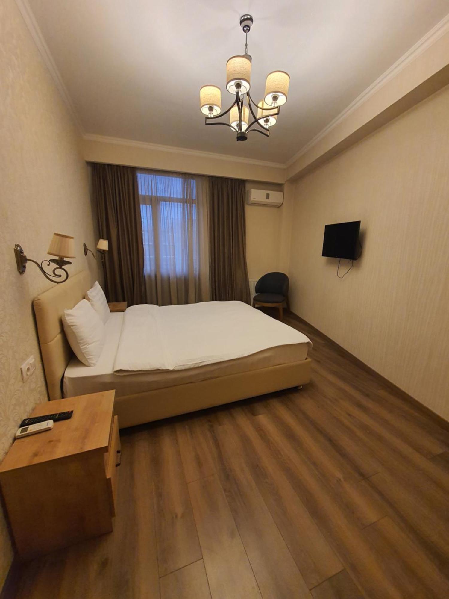 Dat Exx Apartments Tiflis Habitación foto